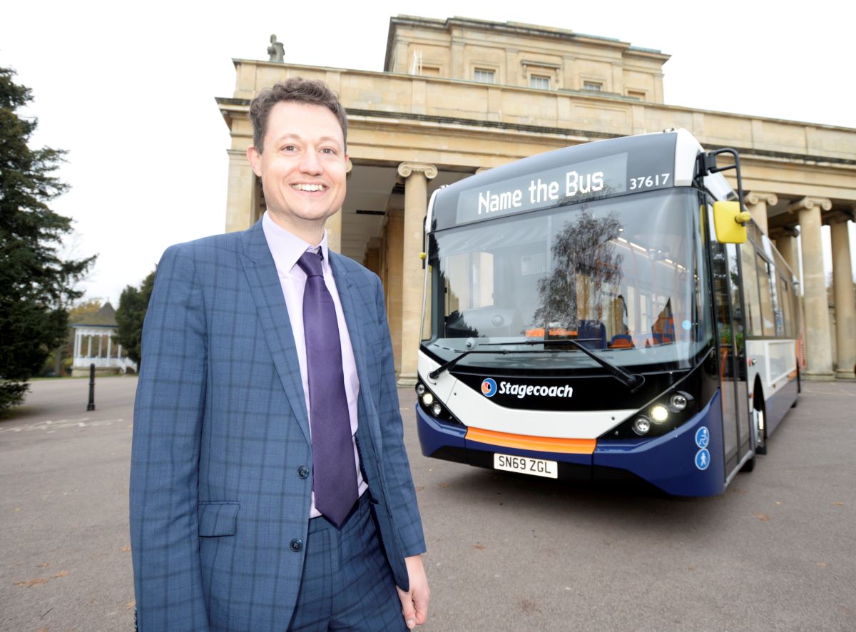 Rupert Cox stood beside Stagecoach bus